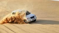 Safari dans le désert de Dubaï le matin avec promenade en quad, traversée des dunes et surf sur les dunes Safari dans le désert de Dubaï le matin avec promenade en quad, traversée des dunes et surf sur les dunes
