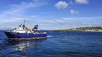Transfert aller-retour en bateau à Inis Oirr dans les îles d'Aran au départ de Doolin Transfert aller-retour en bateau à Inis Oirr dans les îles d'Aran au départ de Doolin