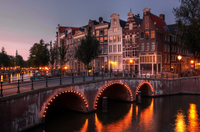 Crucero a la luz de las velas por los canales de Ámsterdam Crucero a la luz de las velas por los canales de Ámsterdam