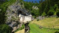 Postojna Cave and Predjama Castle Bike Tour from Ljubljana