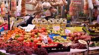 Imagen Recorrido gastronómico a pie por Valencia, con visita al Mercado de Colón y cata de vinos