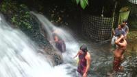 Balinese Ritual Bathing Experience at Waterfall Temple