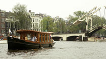 Excursão particular personalizável: cruzeiro turístico pelos canais de Amsterdã Excursão particular personalizável: cruzeiro turístico pelos canais de Amsterdã