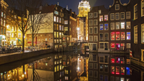 Crociera sui canali di Amsterdam con cena e guida a bordo Crociera sui canali di Amsterdam con cena e guida a bordo