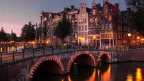 Crucero a la luz de las velas por los canales de Ámsterdam Crucero a la luz de las velas por los canales de Ámsterdam