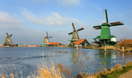 Excursion en bord de mer à Amsterdam : excursion d'une demi-journée aux moulins à vent de Zaanse Schans, à Marken et Volendam Excursion en bord de mer à Amsterdam : excursion d'une demi-journée aux moulins à vent de Zaanse Schans, à Marken et Volendam