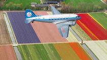 Eksklusivt for Viator: Sightseeingtur med Dakota-fly over Amsterdam og tulipanmarkerne, og spring-køen-over-entré til Keukenhof-parken Eksklusivt for Viator: Sightseeingtur med Dakota-fly over Amsterdam og tulipanmarkerne, og spring-køen-over-entré til Keukenhof-parken