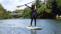 Clase de surf con remo en la orilla norte Clase de surf con remo en la orilla norte