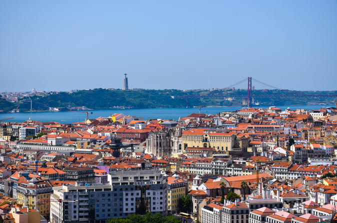 Lisbon to Porto private tour with stop at Óbidos Nazaré Fátima and Aveiro