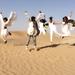 Luxury Abu Dhabi Desert Safari Evening With Belly Dance, BBQ Dinner, Camel Ride, Sand Boarding and Dune Bashing