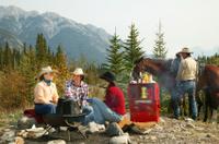 Covered Wagon or Horseback Ride in Banff with Western Cookout