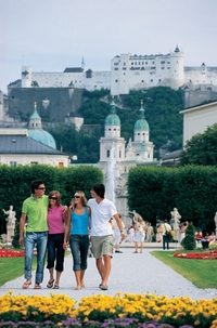 Stroll through the world-famous Mirabell Gardens with Hohensalzburg Fortress in the background