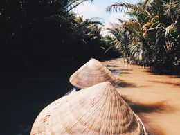 Photo of Sampan rides along the Mekong canals We capped off the tour with a short 10-minute sampan ride along the Mekong canals. We each got to wear the traditional Viet straw hat and row the boat if we wanted to! , Nur Mirrah A - April 2016