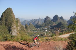 Photo of Bike Adventure in Yangshuo Dirt road trail with karst mountains Yangshuo is famous for - May 2012