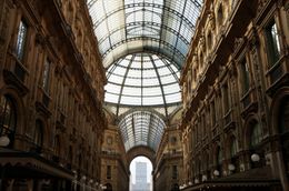 Photo of The Galleria Vittorio Emanuele II Center of Milano City. The structure is formed by two glass-vaulted arcades intersecting in an octagon covering the street connecting Piazza del Duomo to Piazza della Scala. , Jenny B - October 2012