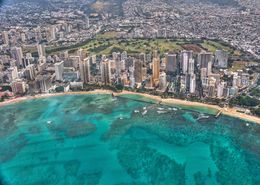 Photo of Honolulu - Waikiki The little pink Royal Hawaiian is the original. Built in the late 20's it was one of 2 on Waikiki when Japan attacked Pearl Harbor , Tom S - February 2016