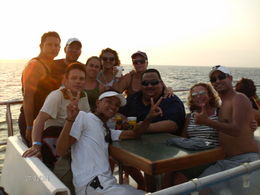 Photo of On the way back on the boat My husband and me having fun with a group of local people on the boat, drinking and eating fantastic pineapple , Orit N - May 2011