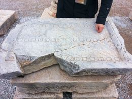 Photo of Ephesus Board Games Our tour guide showing us a backgammon board at Ephesus. , Amy C - December 2012