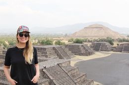 Photo of Teotihuacan Pyramids This is a photo of me from the top of the Pyramid of the Moon with the Pyramid of the Sun in the background. , Charles A - May 2016