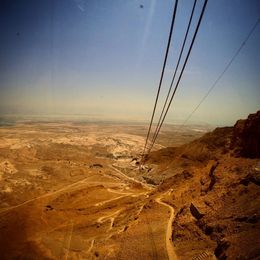 Photo of Masada. On the tram going up to Masada looking down at the snake path and the Dead Sea in the back. , katreilla_sf - September 2015