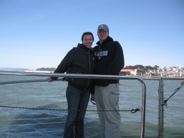 Photo of View of the city from the boat on SF Bay Standing on the side of the cruise boat to get a good picture of us with San Francisco in the background., Diana B - June 2008