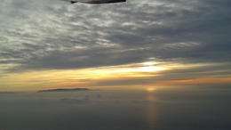 Photo of Catalina Island On a cloudy day, the sunset hides, and leaves Catalina, to rest the night. A and G Valenzuela , Arianna V - December 2014