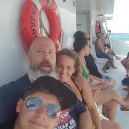 Photo of Culebra Day Trip on the Catamaran on the way back.... Linda Blessing me Shawn Munden my better half with the beard Bronson Blessing our son , Linda B - July 2016