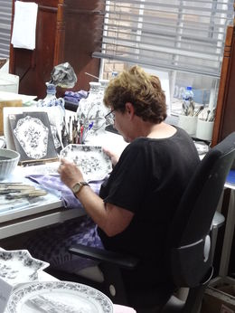 Photo of Delft Factory Tour We were fortunate to be able to watch one of the artists hand painting! It was amazing to see how it is all done - you never appreciate these things until you witness what it takes to create them! , Terry P - July 2016