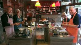 Photo of Cooks on the tour Met some wonderful friends, from Canada and North Carolina. To start the cooking we had to have some liquid refreshment in our cooking aprons. , Angie P - September 2015