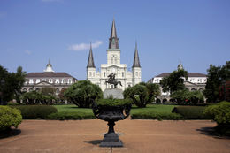 Photo of St. Louis Cathedral with Planter Saint Louis Cathedral stands past a cast iron planter in New Orleans' Jackson Square - May 2011