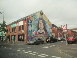 Photo of Black Cab part of Tour Black Cab stop at Mural Memorial to Bobby Sands, the first hunger striker to die during struggle to gain Political Prisoner status. , Ray R. - October 2014