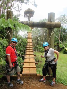 Photo of Zipline Bridge My husband and I posing before climbing one of the bridges to a zipline platform , Jennifer N - August 2016