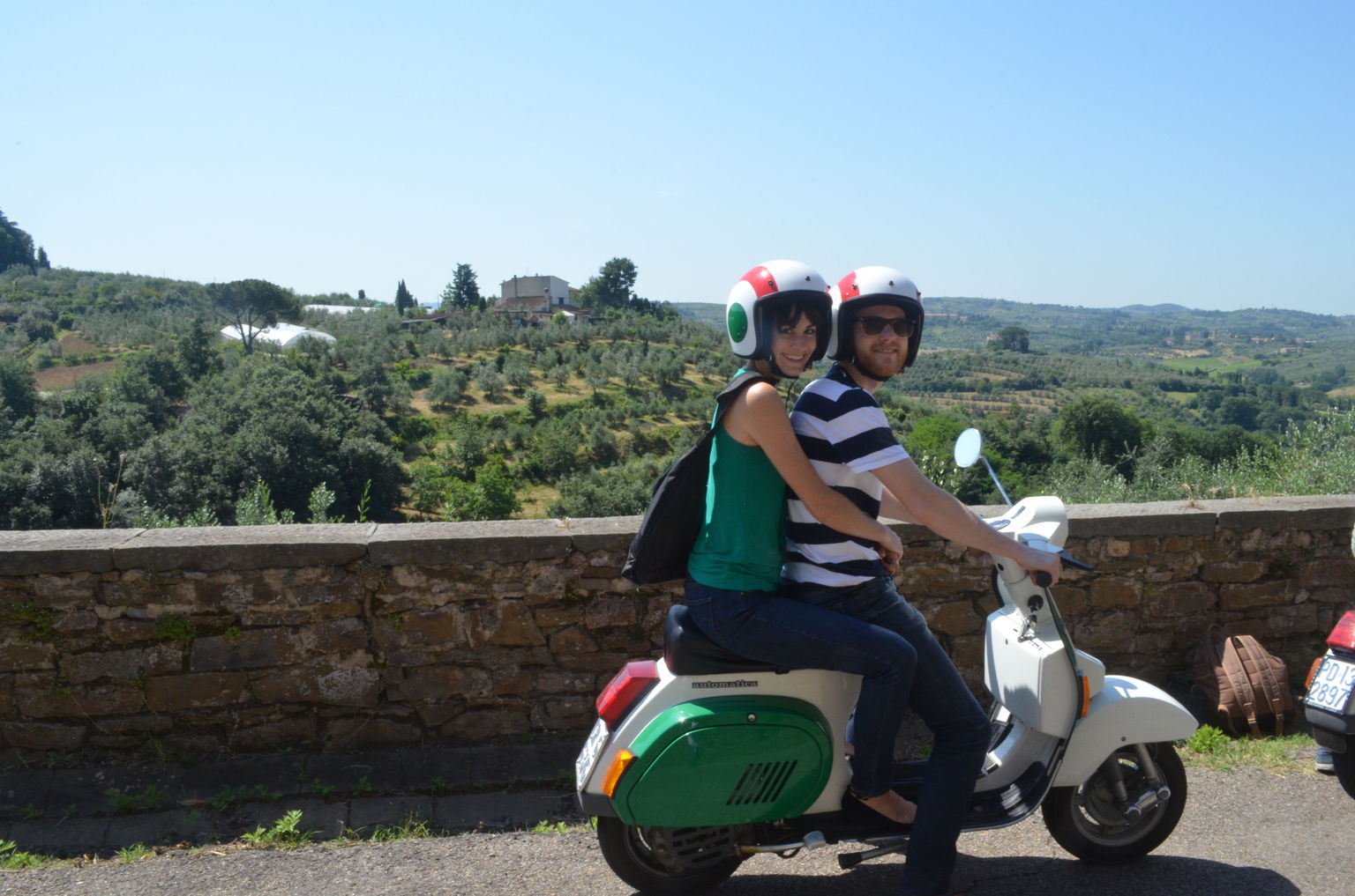 My wife and I in the Tuscan countryside on a Vespa!