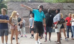 Photo of Roosevelt Monument This is our tour guide, John A, explaining the different statues at the Roosevelt monument. , Audrey C - July 2016