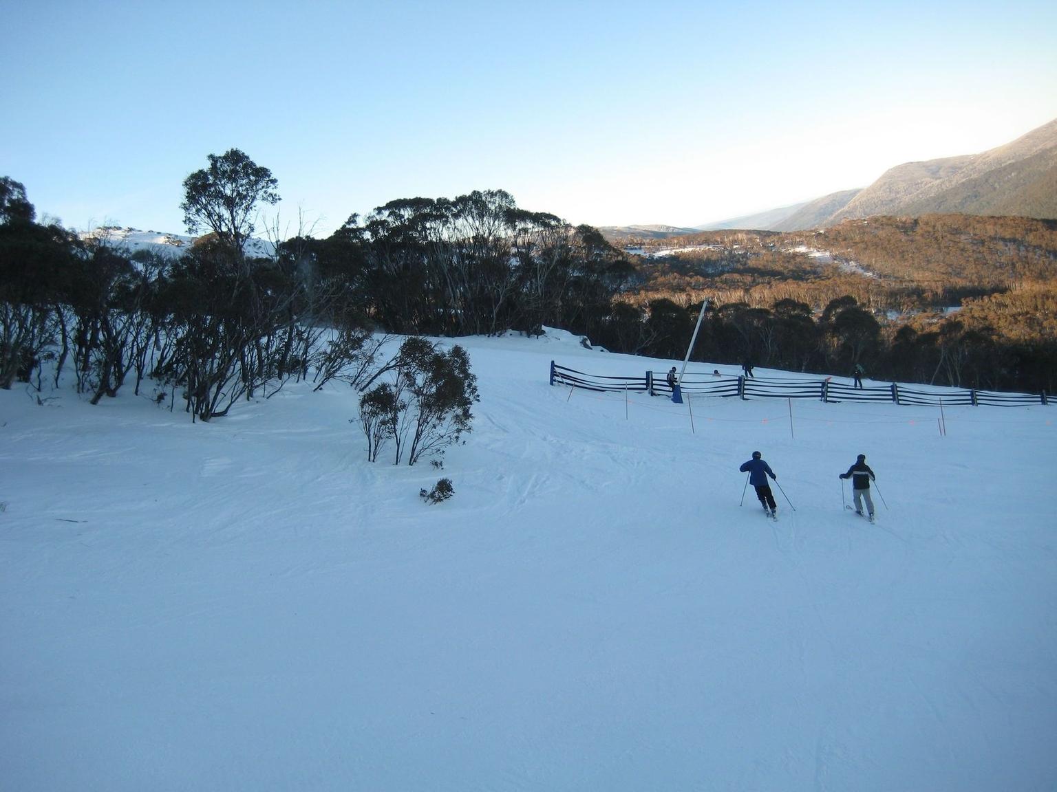 Skiers going down the slopes