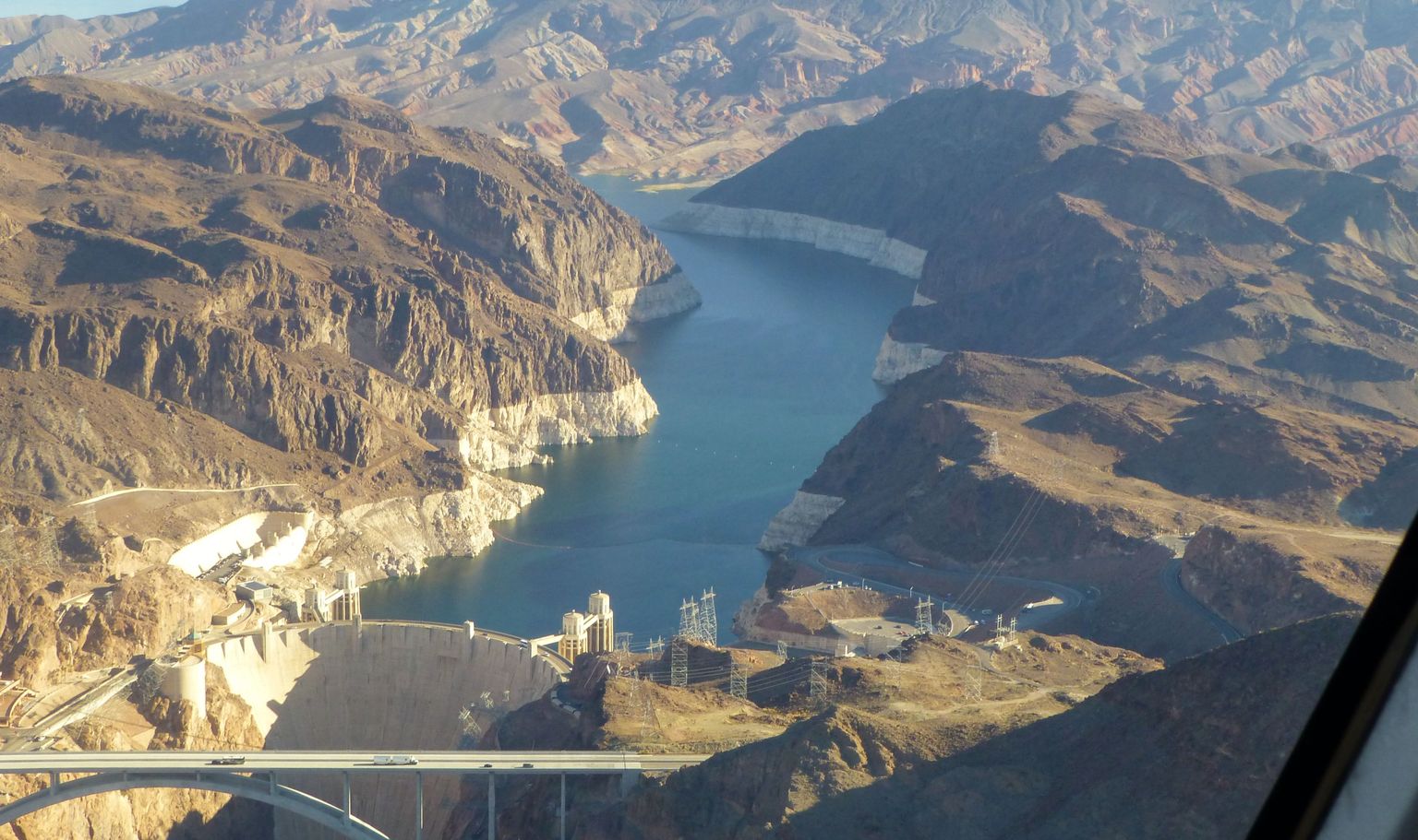 Flying over the Hoover Dam on our way to the descent onto the private bluff