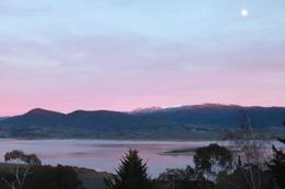Photo of Moon in the morning sky The pink hues makes the view of Jindabyne lake from the resort lovely in the early morning as we queue up for breakfast., Jason Wuen Jin D - August 2009