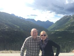 Photo of On our way up the summit My dad and I at one of the many beautiful stops on the White Pass Summit Excursion. Photo cred. by our awesome tour guide, Tyler T-Bone. , Karen B - August 2015