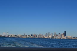 Photo of The Seattle Skyline View of the Seattle skyline taken from the boat on route to Tillicum Village. The water really is as blue and the sky as clear as they look. , Patricia G - August 2014