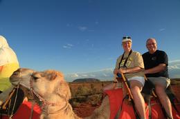 Photo of We had a blast. This is a and quot;must do and quot; on your trip to Uluru. Lynda and Tom on our camel and quot;Spinnifax and quot;. , Lynda S - December 2013