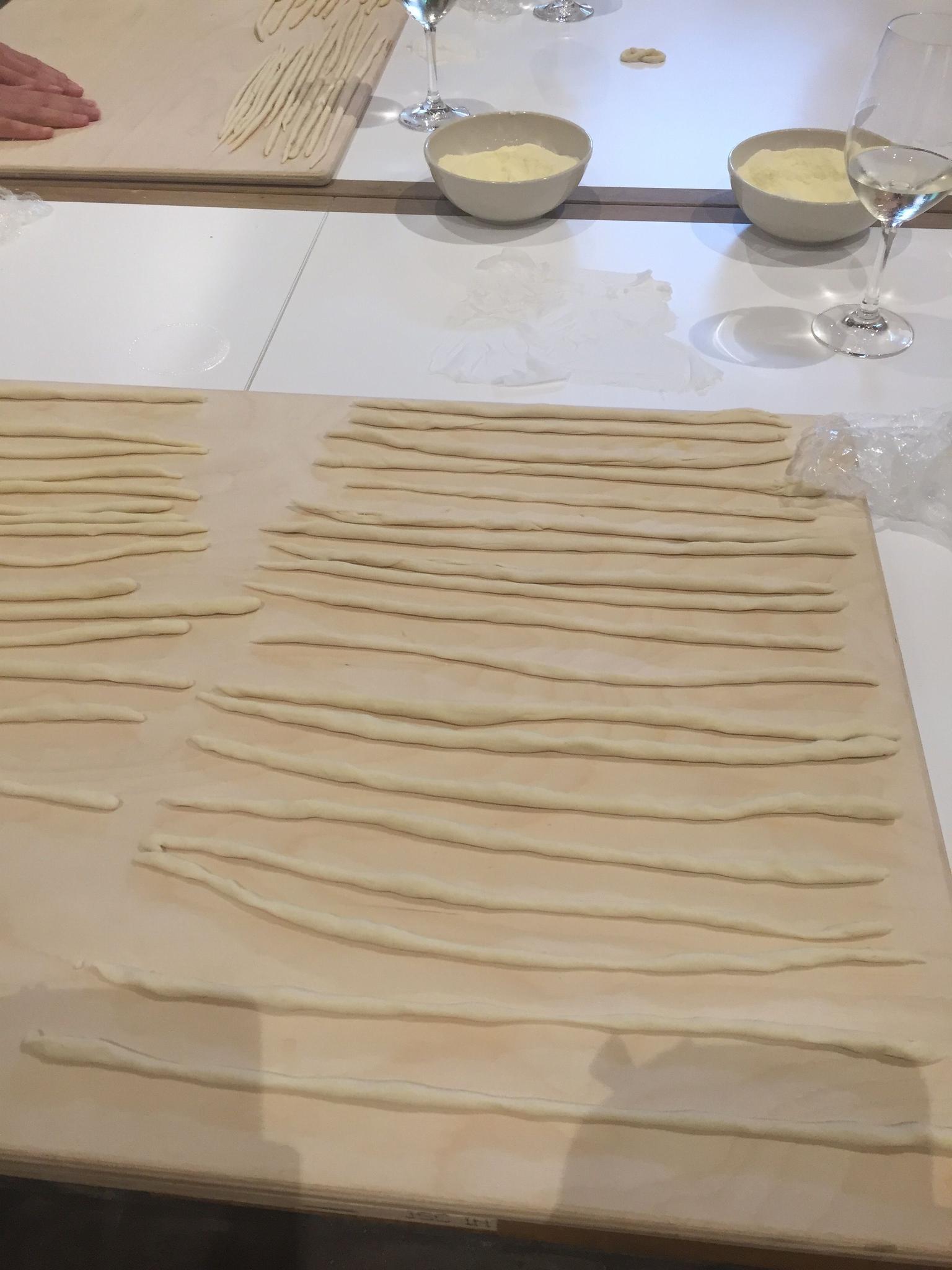 Dough rolled in to pici pasta