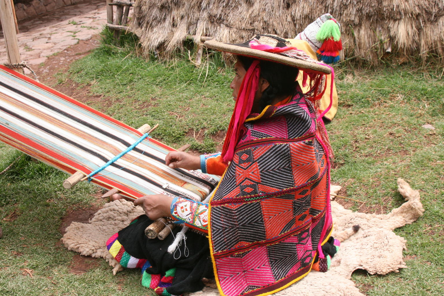 Weaving alpaca yarn in Sacred Valley