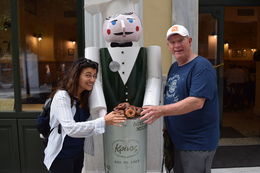 Photo of Vivian introducing us to Greek donuts! Vivian took a quick pose with my husband before she introduced us to Greek donuts. So much fun!!! , tammyholland1165 - August 2016