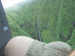 Photo of hidden waterfalls from the perfect view Leaning over to my husbands side Jim. our pilot taking us by the hidden falls where Jurassic Park was filmed. , Steve C - August 2016