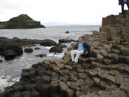 Photo of Awesome! My husband having a photo op at the Giant Causeway. It really amazes me how geometric the rock patterns were. It was unbelievable. , Dahlia M - August 2013