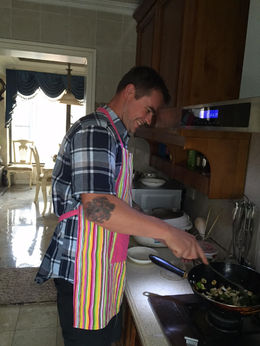 Photo of Comfortably Cooking in Chengdu Here I am cooking some kung pao chicken. Loved the experience and I will definitely return. , Meghan M - September 2015