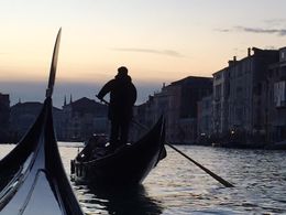 Photo of Sunset on the Grand Canal We were lucky to be on the Grand Canal at sunset .. and to on be the second gondola rather than the first, so that I could snap this gondolier in the evening light. , kmaria1202 - January 2016