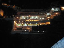 Photo of La Perla - cliff divers Looking back up at La Perla restaurant from near the bottom of the cliffs , Leah - May 2011