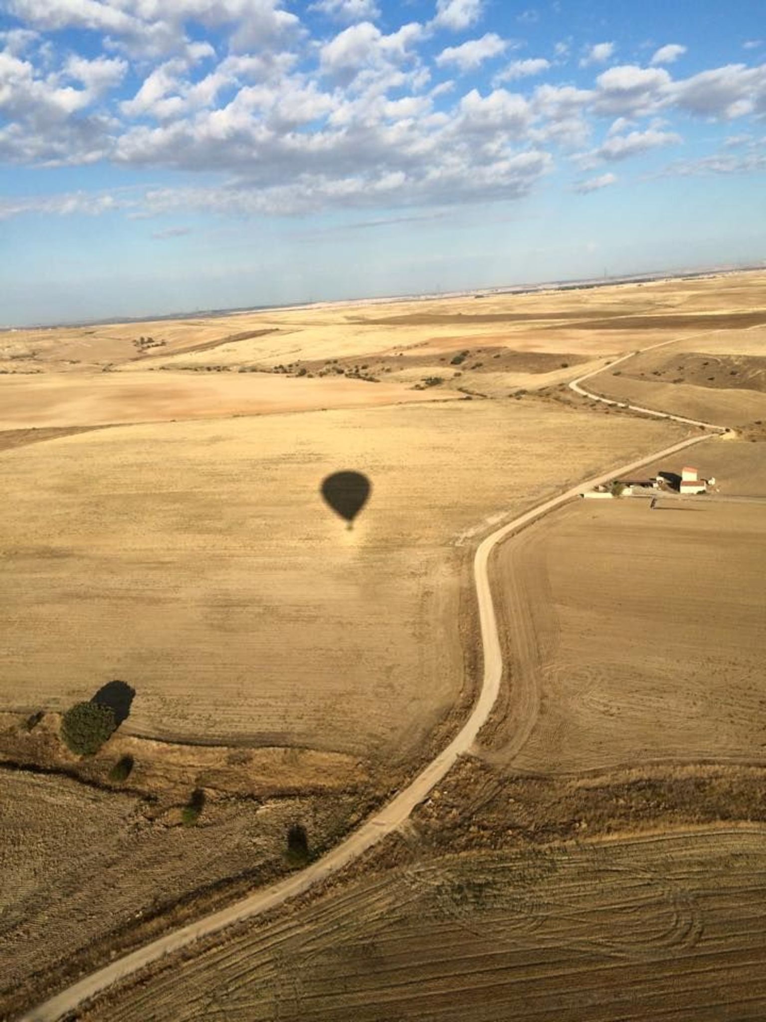 Our shadow against the beautiful backdrop of Segovias farmlands