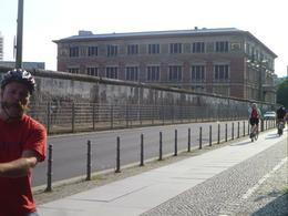 Photo of Tom and his wonderful moustache! Here we are with Tom by one of the remaining sections of the Berlin Wall. , Ollie - August 2013